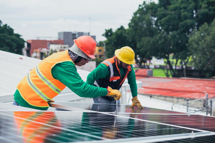 engineers installing solar panels